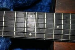wash the gunk off your fretboard