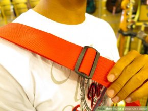 Image titled placed a Strap On a Guitar action 5