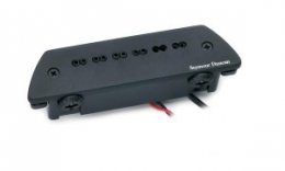 The MagMic integrates a microphone with a hum-cancelling magnetized pickup.